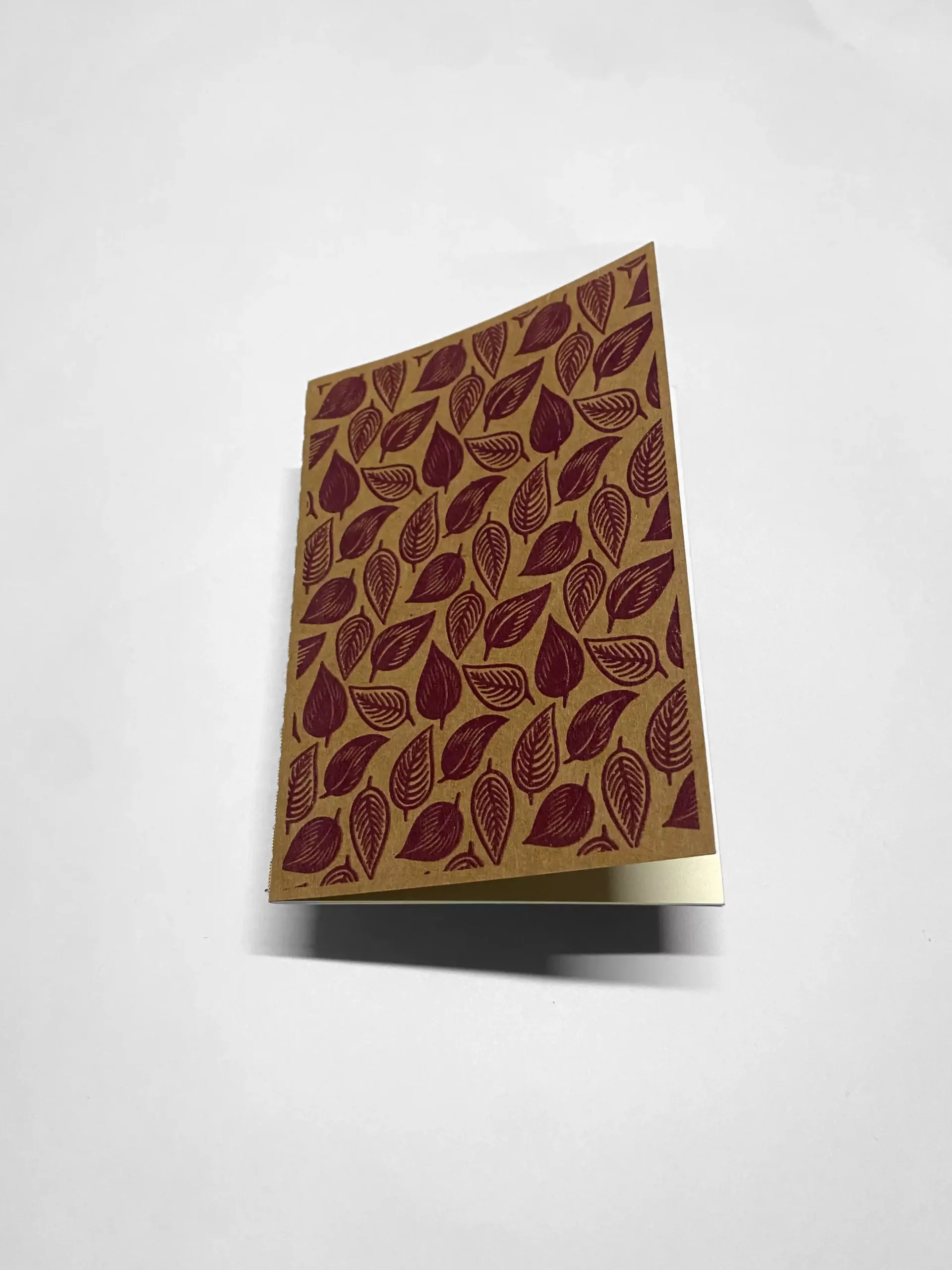 Carnet motif feuilles bordeaux