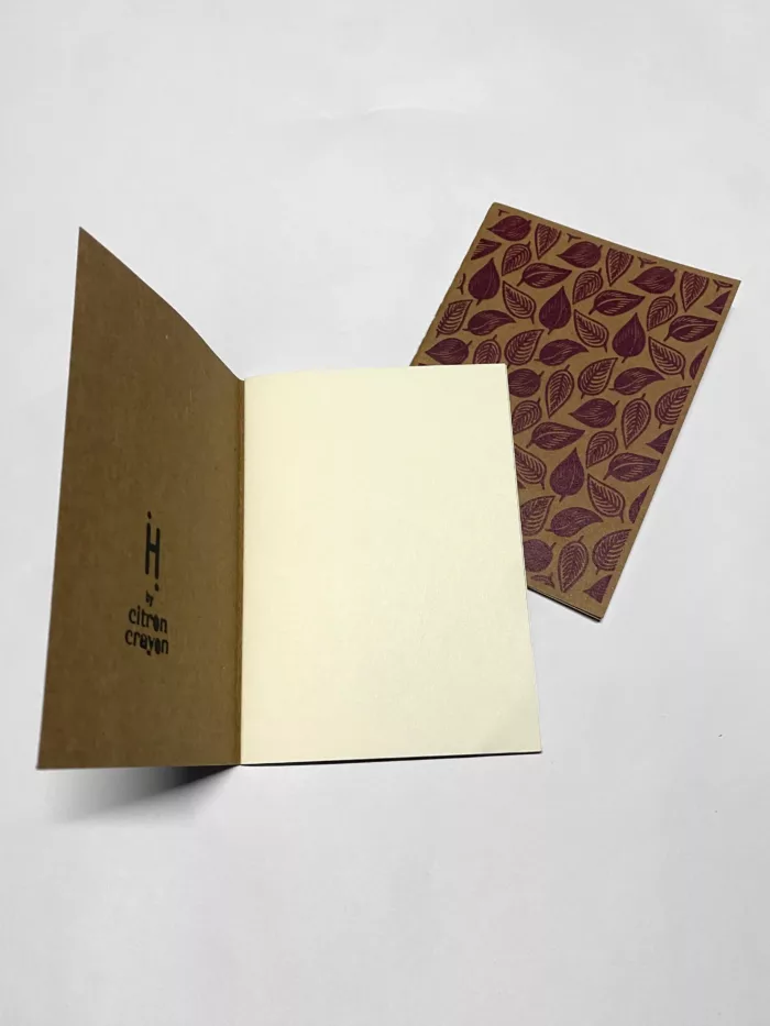 Carnet motif feuilles bordeaux